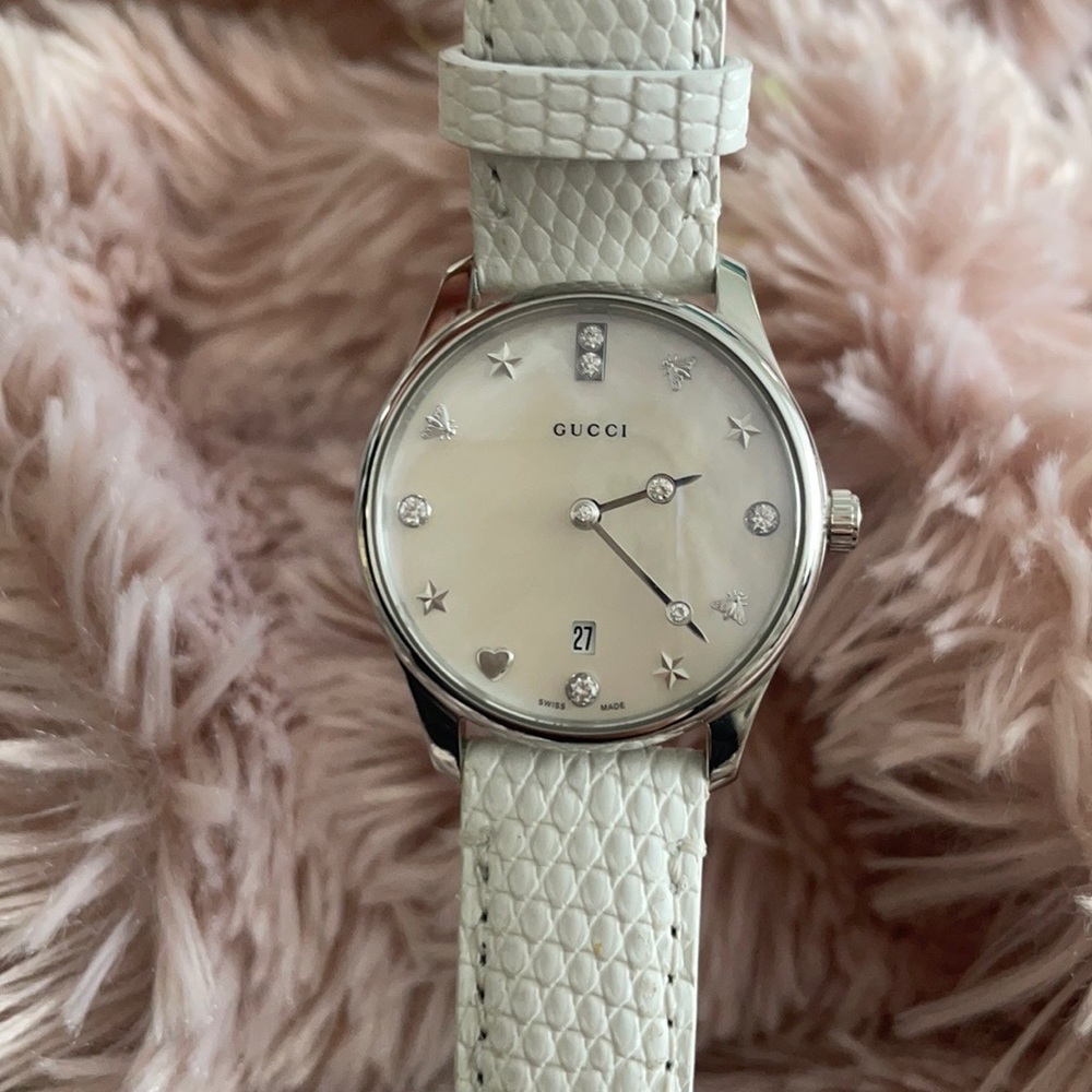 Gucci G timeless diamond mother of pearl Swiss watch